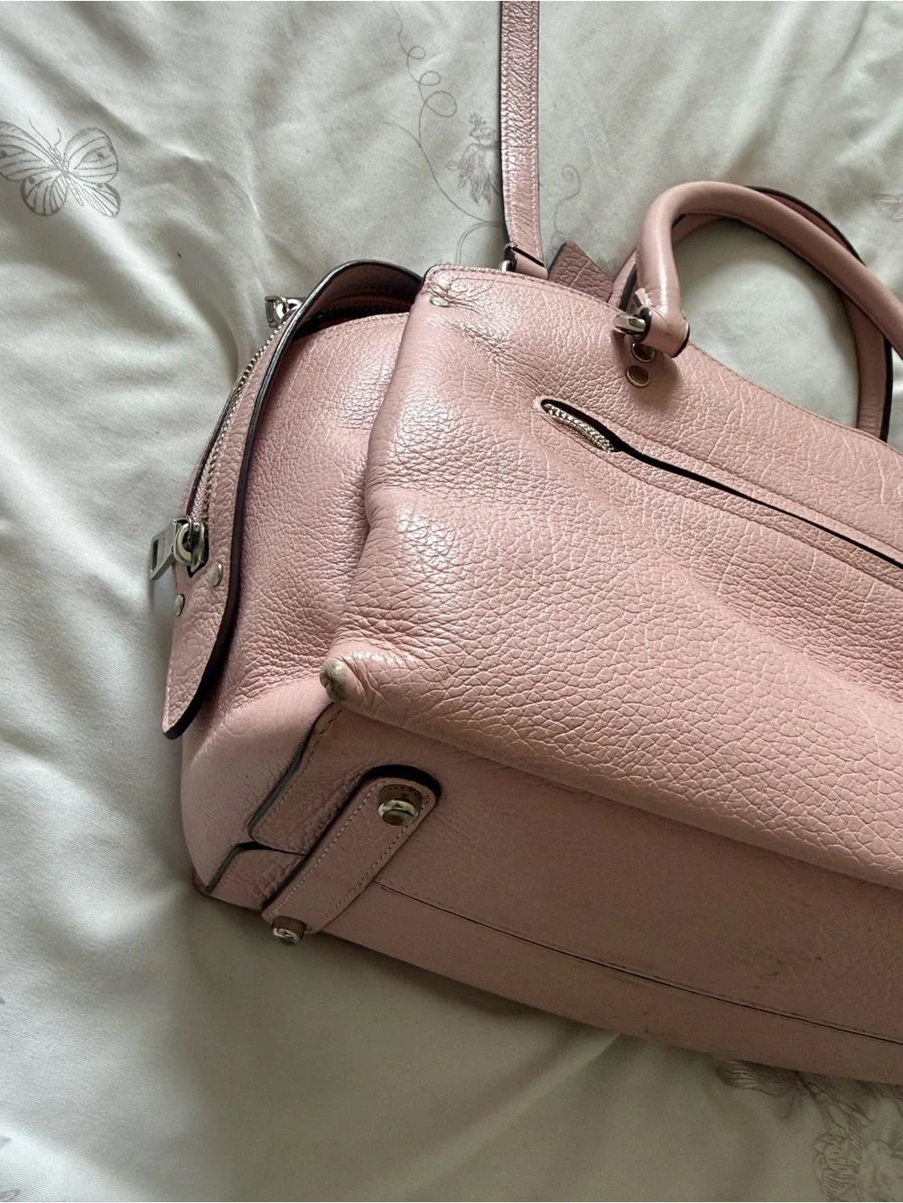 Coach compact pebbled